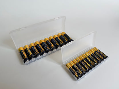 Ten batteries arranged inside a reusable plastic box